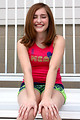 Free Stock Photo: A cute young girl posing outdoors on bleachers