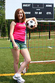 Free Stock Photo: A cute young girl posing with a soccer ball