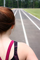 Free Stock Photo: A cute young girl on a track field