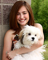 Free Stock Photo: A cute young girl posing with a small dog
