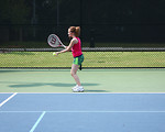 Free Stock Photo: A cute young girl playing tennis
