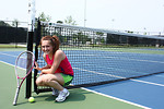 Free Stock Photo: A cute young girl playing tennis