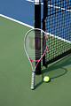 Free Stock Photo: A tennis racquet and ball on a tennis court