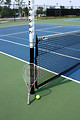 Free Stock Photo: A tennis racquet and ball on a tennis court