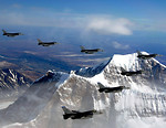 Free Stock Photo: Fighter jets flying in formation above mountains