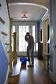Free Stock Photo: An African-American man mopping his home floor
