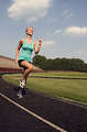 Free Stock Photo: A young woman jogging outdoors