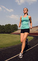 Free Stock Photo: A young woman jogging outdoors