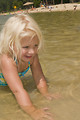 Free Stock Photo: A young girl playing in the water at a beach
