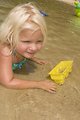 Free Stock Photo: A young girl playing in the water at a beach