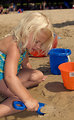Free Stock Photo: A young girl playing in the water at a beach