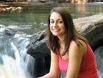 Free Stock Photo: Teen girl sitting on rock by river