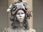 Free Stock Photo: Closeup female living statue in silver