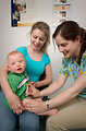 Free Stock Photo: An infant receiving a vaccination shot from his doctor