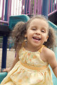 Free Stock Photo: A young girl playing on a playground