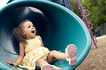 Free Stock Photo: A young girl playing on a playground