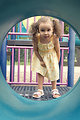 Free Stock Photo: A young girl playing on a playground