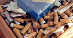 Free Stock Photo: An ashtray filled with cigarette butts