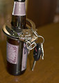 Free Stock Photo: Car keys and a bottle of beer
