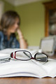 Free Stock Photo: A pair of glasses with an open book