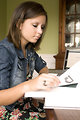 Free Stock Photo: A female student reading a book