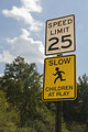 Free Stock Photo: A speed limit sign and children at play sign
