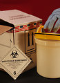 Free Stock Photo: A gloved hand opening a biohazard container