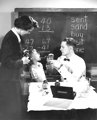 Free Stock Photo: Vintage photo of a doctor examining the throat of a child