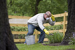 Free Stock Photo: A man gardening outside