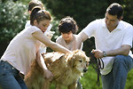 Free Stock Photo: A family giving a dog a bath