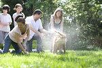 Free Stock Photo: A family giving a dog a bath