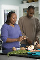 Free Stock Photo: An African-American couple preparing a healthy meal