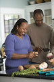 Free Stock Photo: An African-American couple preparing a healthy meal