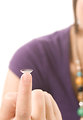 Free Stock Photo: Close-up of a girl holding a contact lens