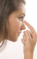 Free Stock Photo: Close-up of a girl putting in a contact lens
