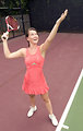 Free Stock Photo: A young woman playing tennis