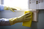 Free Stock Photo: An African-American woman cleaning a window