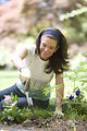 Free Stock Photo: A woman enjoying gardening outdoors