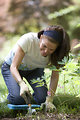 Free Stock Photo: A woman enjoying gardening outdoors