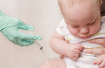 Free Stock Photo: A baby receiving a vaccine injection.