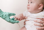 Free Stock Photo: A baby receiving a vaccine injection.