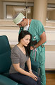 Free Stock Photo: A doctor examining a female patient
