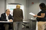 Free Stock Photo: Men and women at a town hall meeting