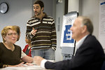 Free Stock Photo: Men and women at a town hall meeting