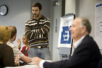 Free Stock Photo: Men and women at a town hall meeting