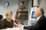 Free Stock Photo: Men and women at a town hall meeting