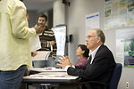 Free Stock Photo: Men and women at a town hall meeting