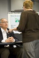 Free Stock Photo: Men and women at a town hall meeting