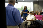 Free Stock Photo: Men and women at a town hall meeting