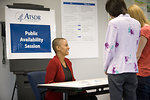 Free Stock Photo: Men and women at a town hall meeting